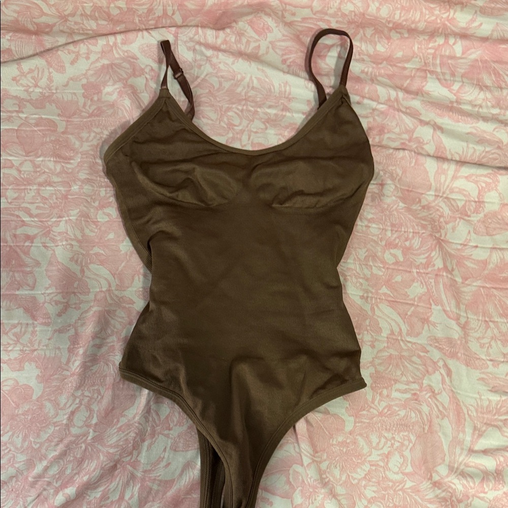 Brown bodysuit